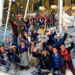 Seattle Sailing Club's Member Community: Homepage Slide of Waving Members