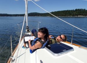 Smiling people on a sailboat - Sailing Lesson - Cruise N Learn