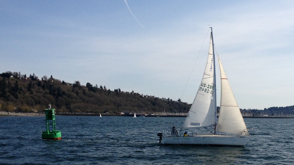 Sailboat sailing around the Buoy